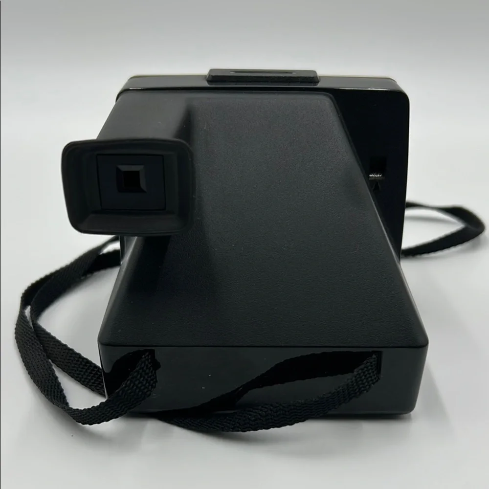 Vintage Polaroid Black and White Film Camera with Instant Photo Feature